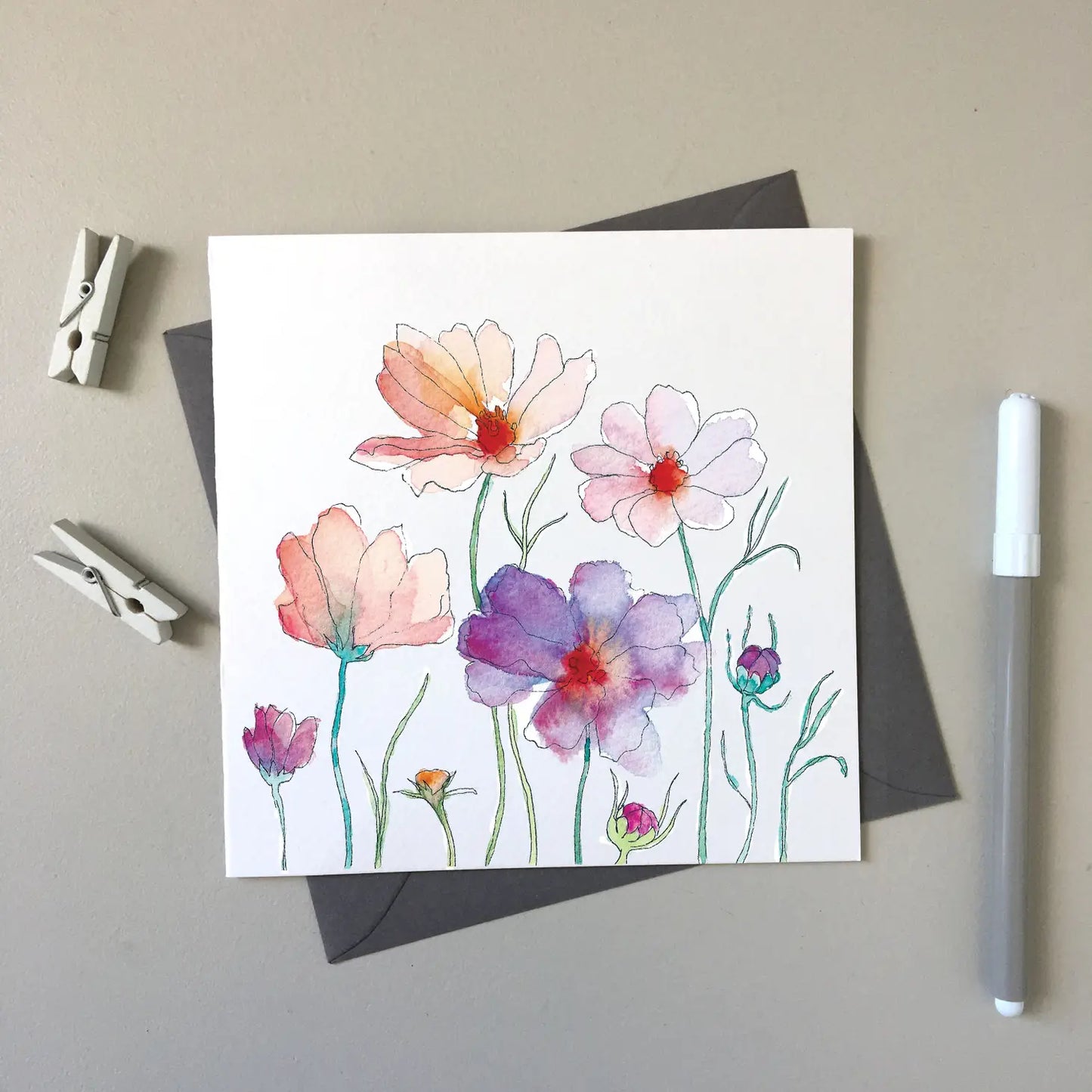 A picture of the Cosmos for Monica card in pastel colors .