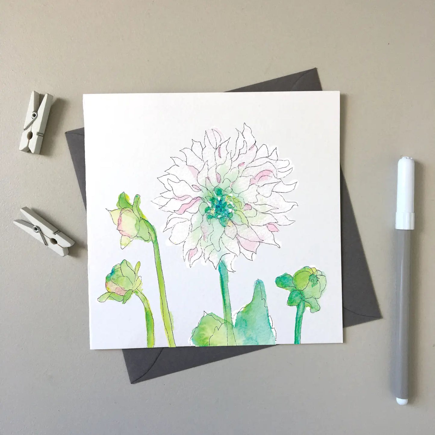 A picture of Dahlias for Polly greeting card in soft whites, pink and green and yellow.
