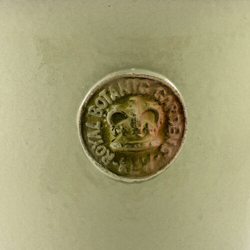 This shows the KEW Royal Botanic Gardens Seal.