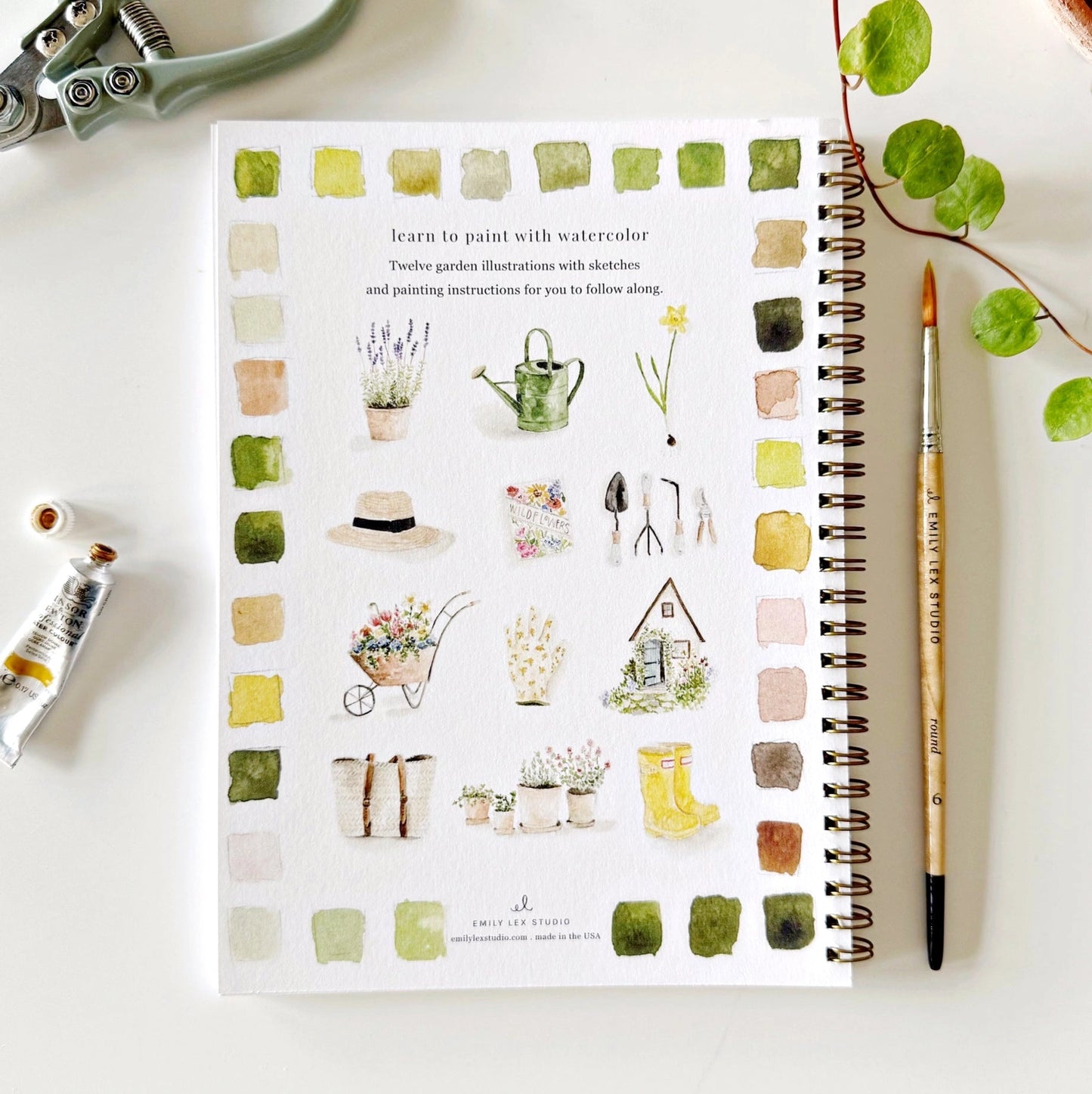 Back cover of Emily Lex Garden Watercolor Workbook with watercolor illustrations of plants, pots, and garden-inspired designs.