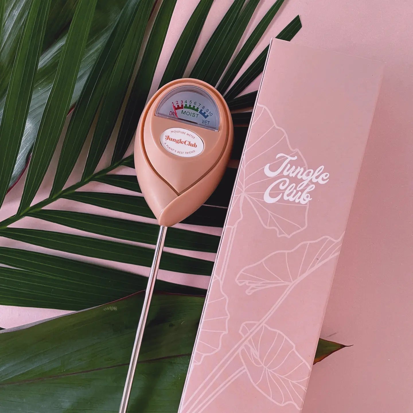 The Pink Moisture Meter shown with it's box.