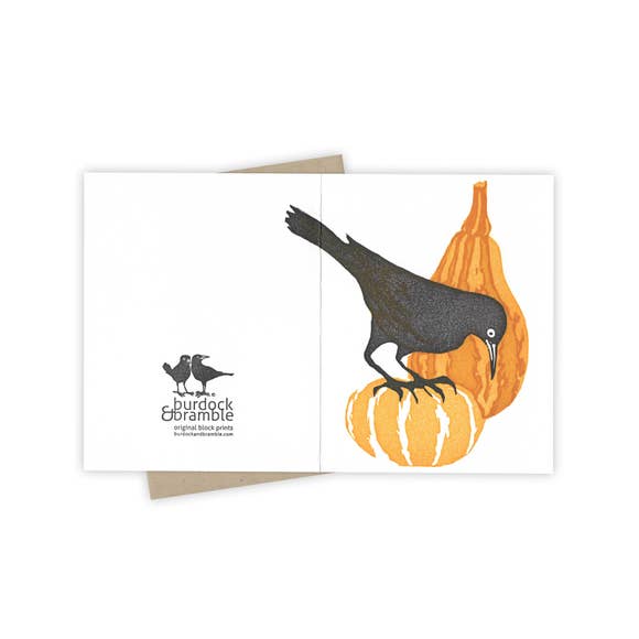 Front and back few of the grackle perched on decorative gourds, celebrating the autumn season card