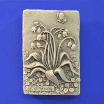 This is the Lily of the Valley Plaque. Delicate flowers and a small butterfly..