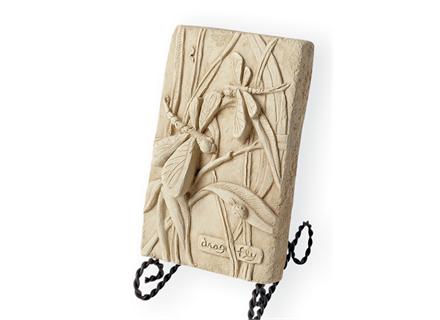 The Dragon Fly Plaque on a wire stand.