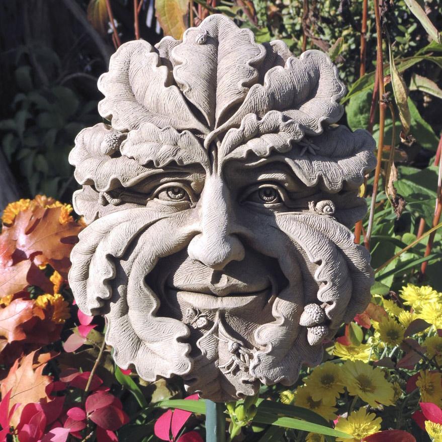 The Green Man hang out in a garden.
