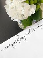 a second picture of the note pad showing the writing at the top.