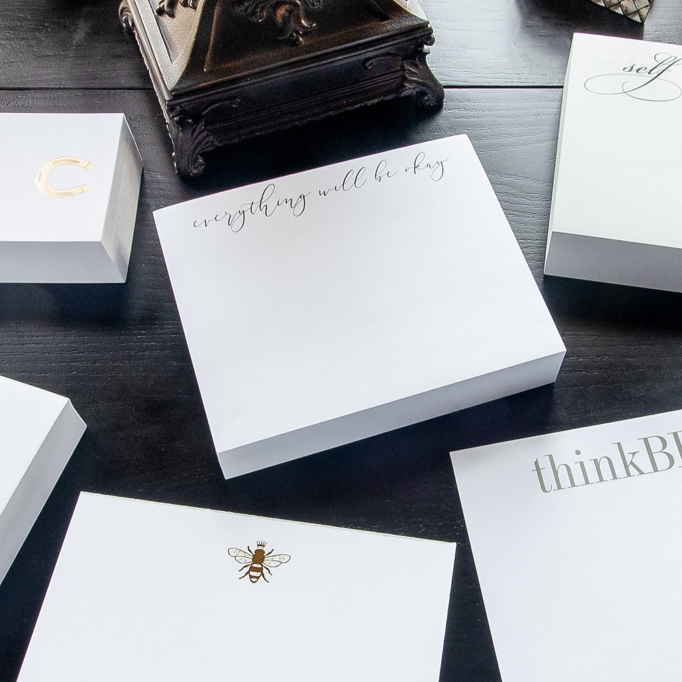 A photo of several different note pads from this collection.