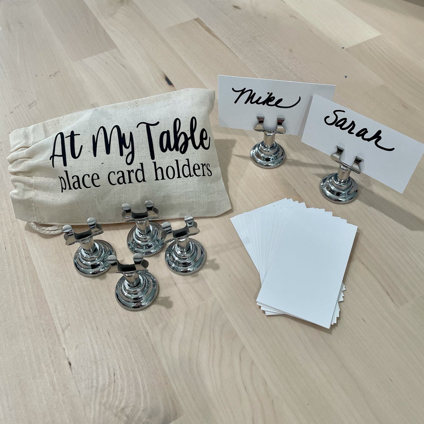 Place card holds come in this cute little bag with place cards for writing names
