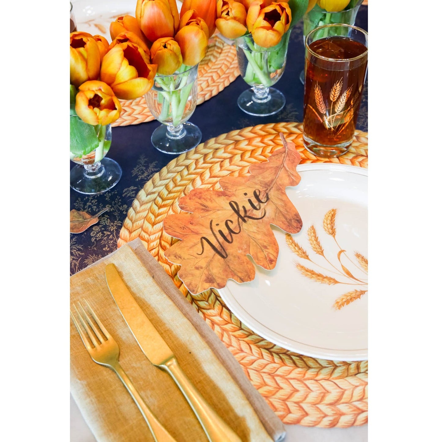 Braided Jute Die Cut Paper Placemat natural color, showing braided texture, during a fall dinner