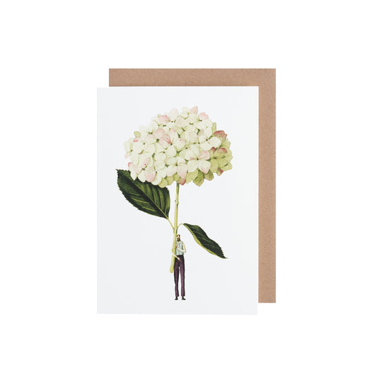 A drawing of a beaded man holding a green and white hydrangea over his head in pastels.