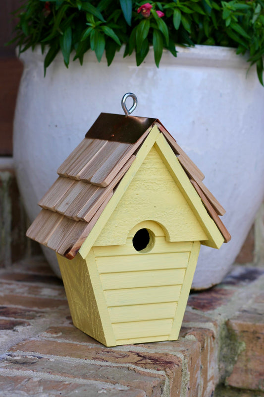 The wren-in-the -wind yellow bird house