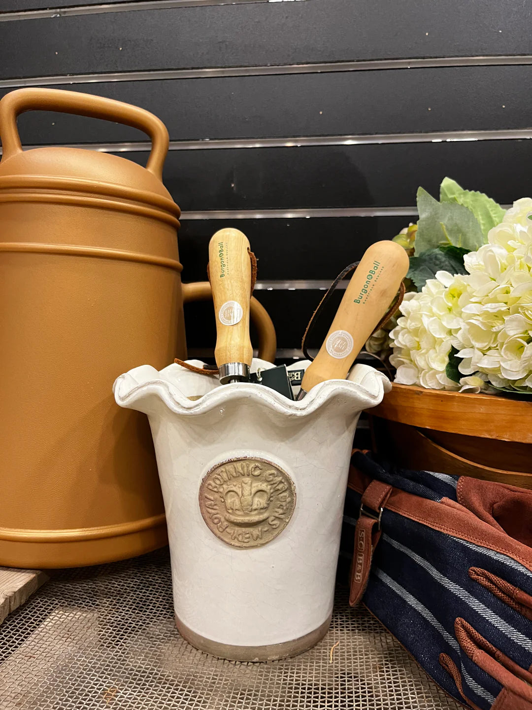 Using the Salisbury piecrust pot as a garden tool holder - so cute