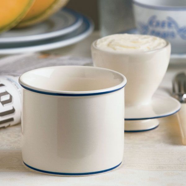 A picture of the Le-bistro crock with the top off showing the bell shaped lid with butter in it.