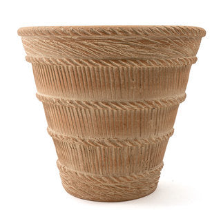 The Large French Harvest Pot in a natural clay color .
