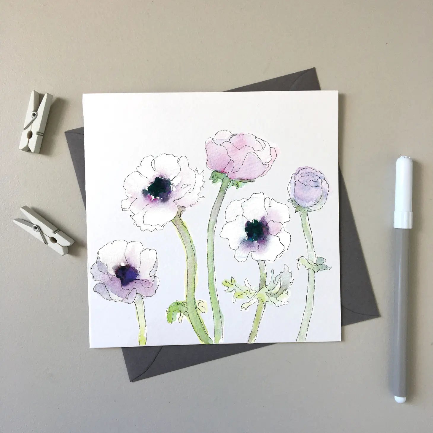 The Anemones Greeting Card in shades of purple and white and green.