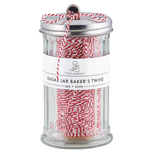 Red and White  bakers's twine stored in a old fashion sugar jar.