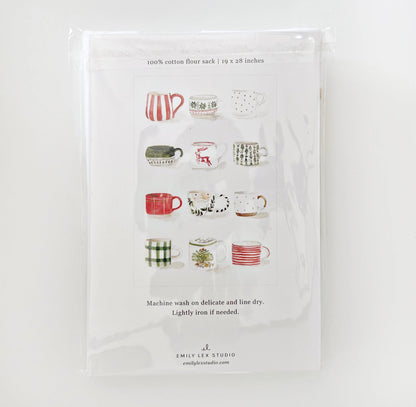 Emily Lex Christmas Mug Tea Towel featuring watercolor mugs of cocoa and candy canes, showing the back of the package