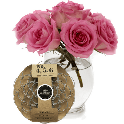The Easy Arrange package shown with a vase with pink roses.