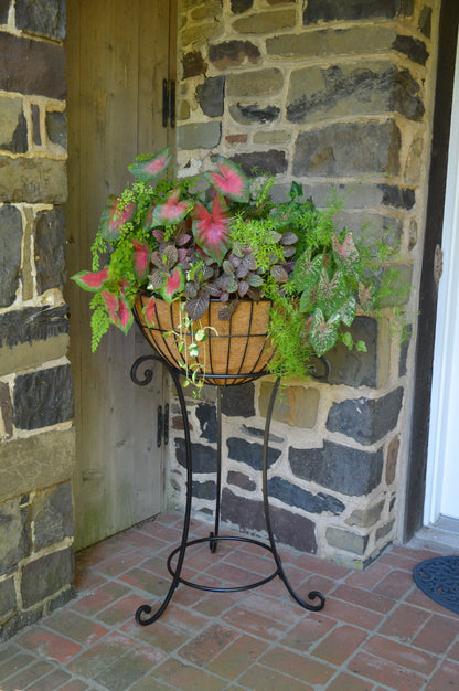 The London Basket shown as a planter using a stand to hold it up.