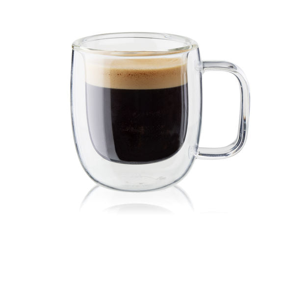 A photograph of the Zwilling Sorrento Espresso Double Walled Mug filled with expresso coffee with a generous crema on the top