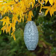 A image of the Solar Stella Wildflower Pod Lantern in Sage Green. 