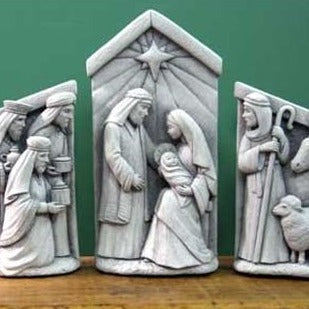 A photograph of the three (3) pieced Nativity Set , showing the traditional images .