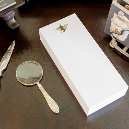 a close up picture of the Gold Foil Embossed Bee Notepad.