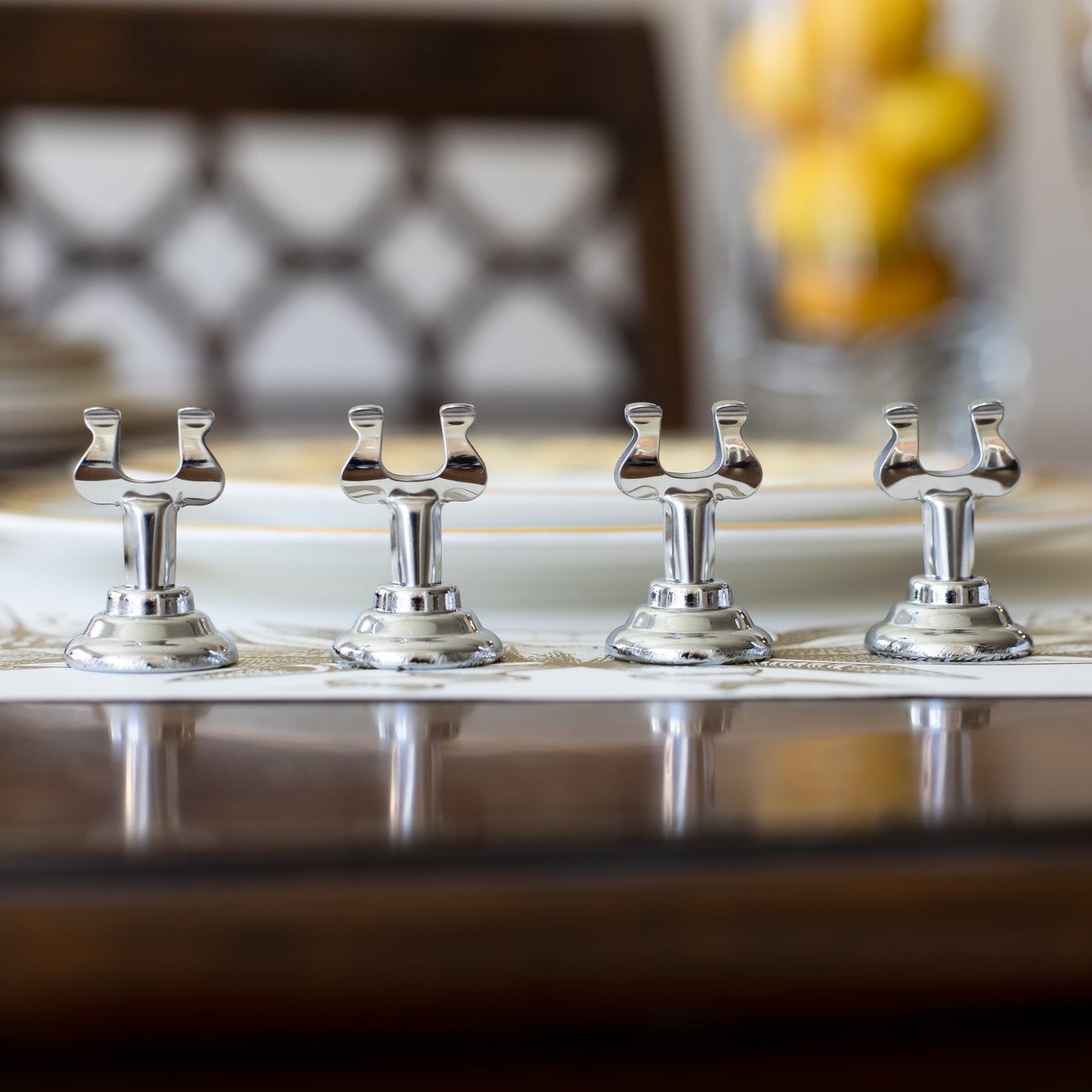 Close up of 4 harp place card in a row.