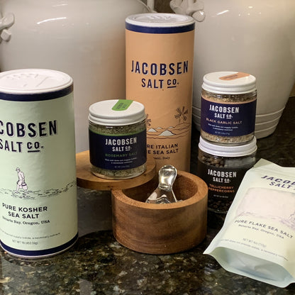 Showing a collection of products form Jacobsen Salt co. Kosher Sea Salt, Rosemary Salt, Black Garlic Salt , Tellicherry Peppercorns and Pure Italian Sea Salt