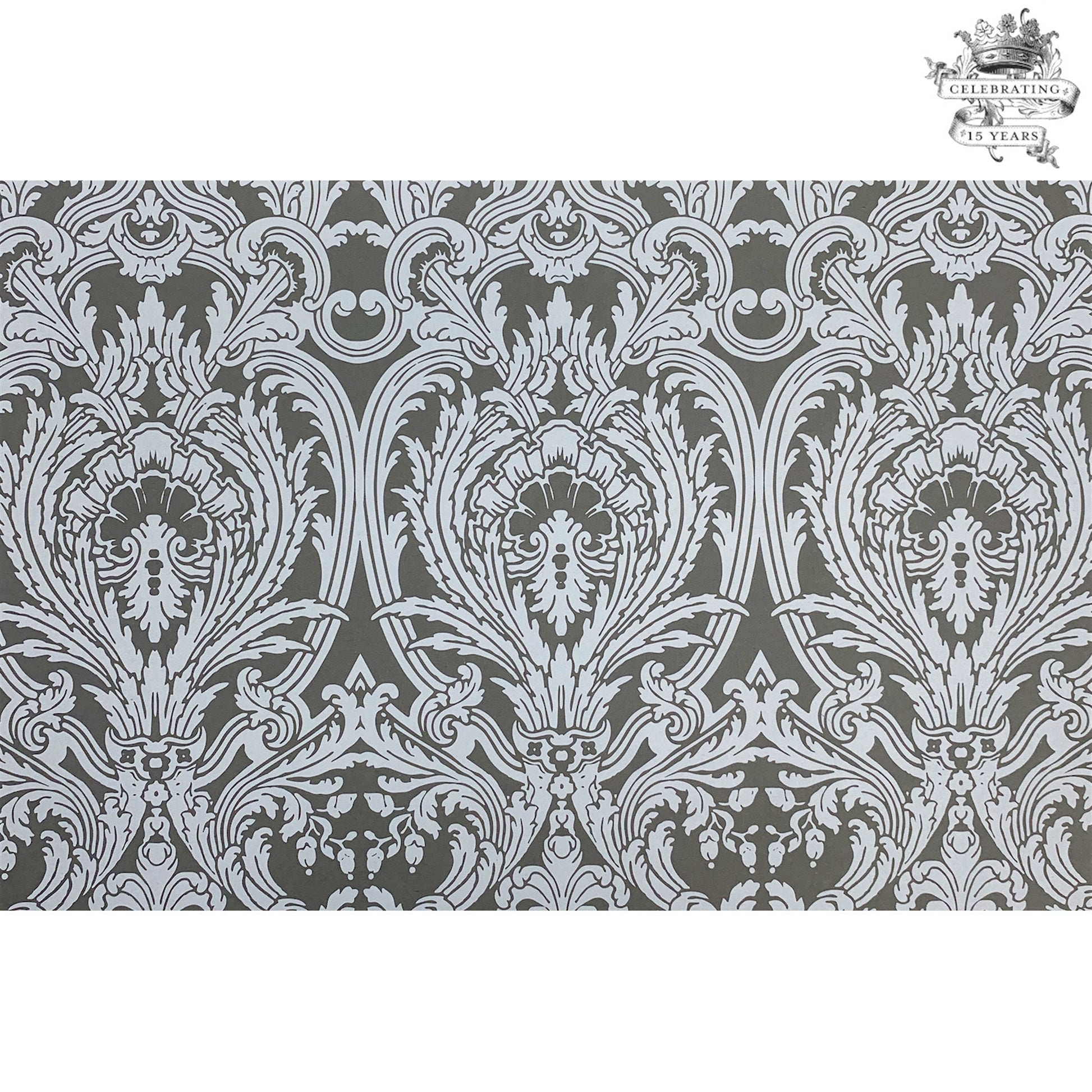 This Tapestry Anniversary Paper Placemat is in white ink on gray paper , very elegant
