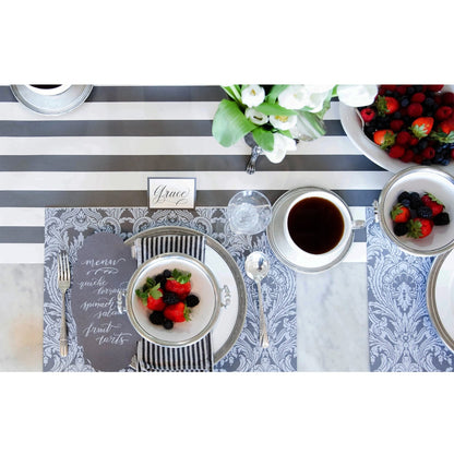 A photograph of the tapestry placemat in breakfast table setting 