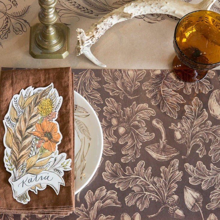 This image is showing the In The Woods placemat setting on a table.