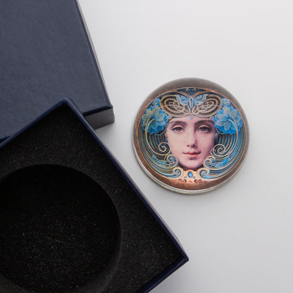 Crystal Domed Paperweight decoupaged with a Art Nouveau Woman's face shown with the padded box for gift giving