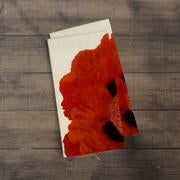 A photograph of the Eastern Red Poppy Botanical Print kitchen/tea towel folded over showing just part of the print. It is a William Curtis’s Print from 1790-1800