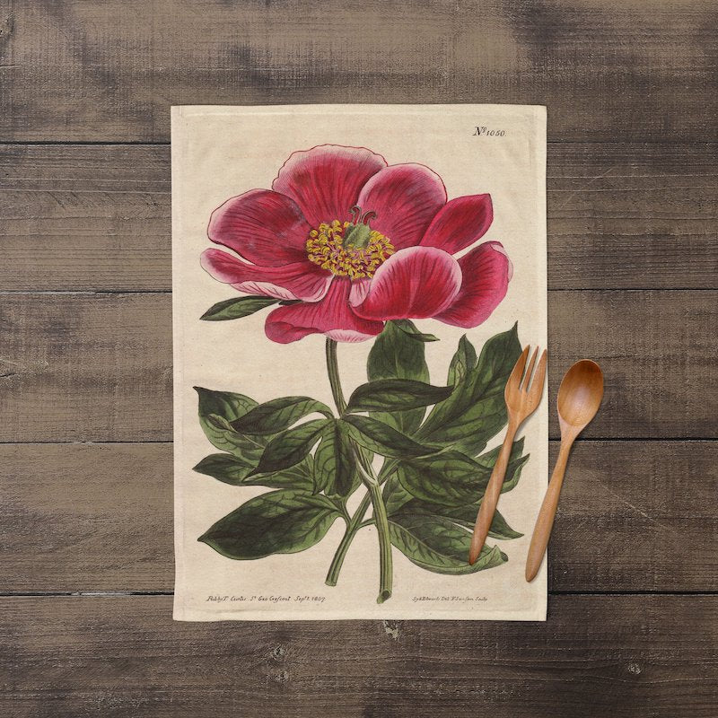 A photograph of the complete Peony Botanical Print lying flat. 