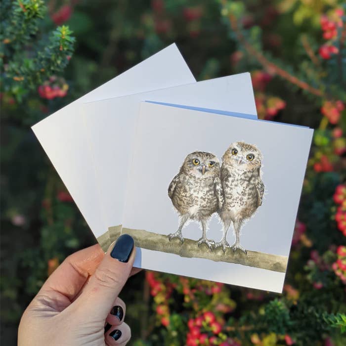 A picture of the baby owls watercolor mini greeting card.