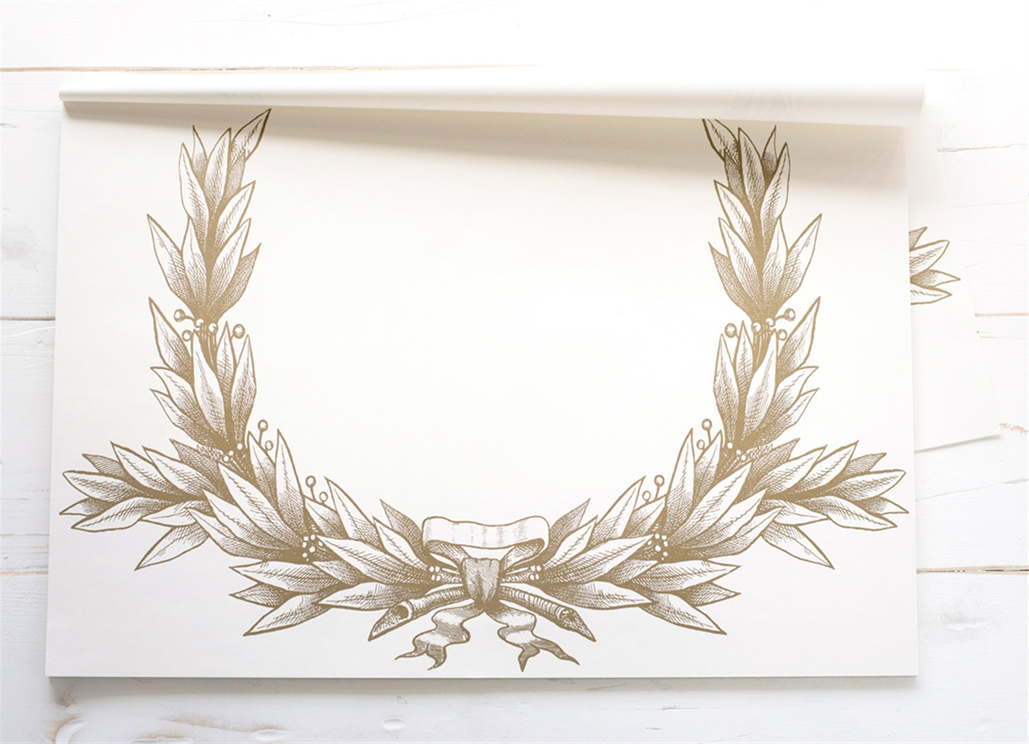 an image of the gold accented laurel wreath placemat. 