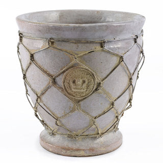 This is a picture of the Buckingham Kew Footed Cachepot with a wired weave all around the body of the pot.