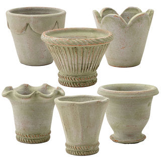 Shows the complete collection of herb pots in moss grey.