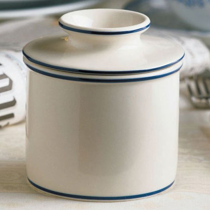 The Le Bistro Butter Bell Crock  is glazed in creamy off-white with hand-painted french royal blue banding around the edges and bottom of the crock. Simple and elegant.